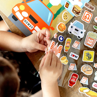 Child playing with Whataburger Little Foodies Sticker Play Set