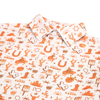 Patterned polo shirt with cowboy-themed illustrations on a white background
