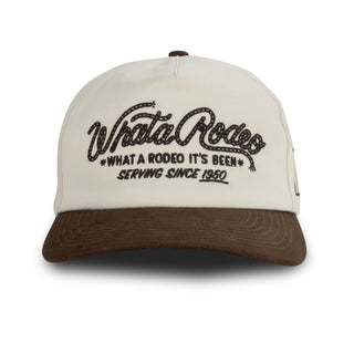 Beige and brown cap with 'What A Rodeo' text on a white background