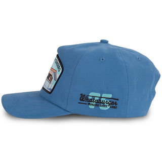 Blue cap with Whataburger logo and embroidery on a white background