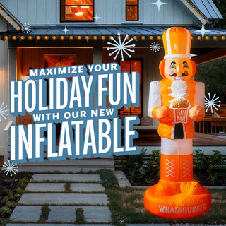 View Whataburger Inflatable Nutcracker in front of house at night. Reads Maximize your Holiday Fun with our new inflatable. 