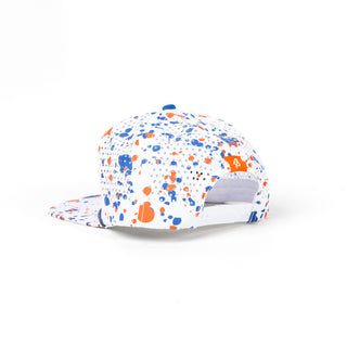 View side of white drip patch staunch collection hat