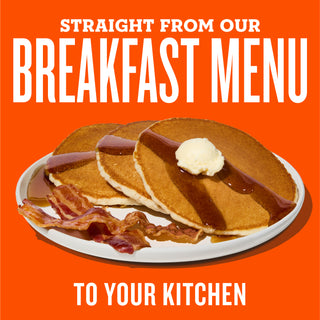 Plate of pancakes with syrup and bacon on an orange background with text about a breakfast menu.