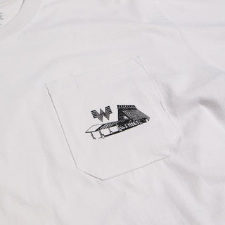 White t-shirt with a small black graphic on the chest pocket