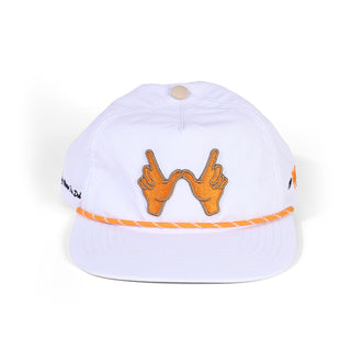 White cap with orange designs on a white background