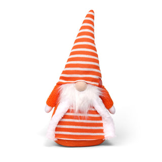 Gnome figurine with orange and white striped hat and outfit on a white background