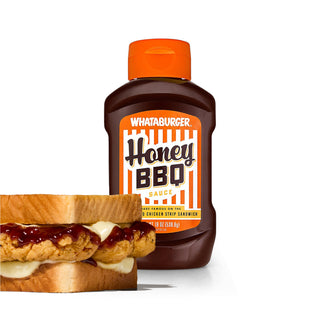 Whataburger Honey BBQ sauce bottle with a sandwich on a white background