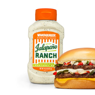 Whataburger Spicy Jalapeno Ranch bottle with a hamburger on a white background