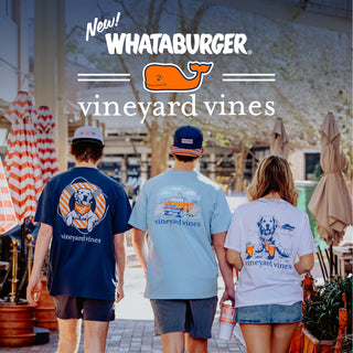 Three people wearing vineyard vines t-shirts with Whataburger branding in an outdoor setting.