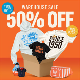 Warehouse sale promotional graphic with large text reading '50% OFF' and 'Thru July 31st' on an orange background, surrounded by apparel and accessories including a white hoodie, white graphic T-shirt, black graphic T-shirt, a small blue-and-orange shoe, a navy shirt, and a red-and-white striped cooler bag.
