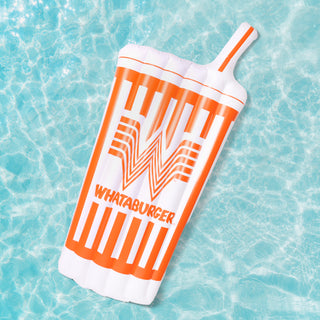 Whataburger Cup Pool Float floating on blue water.