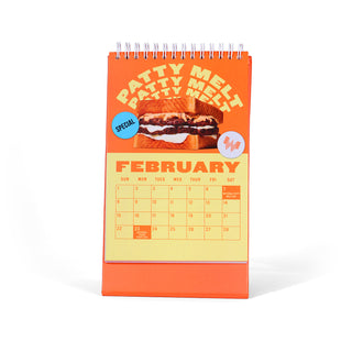 Calendar with a patty melt design on an orange background