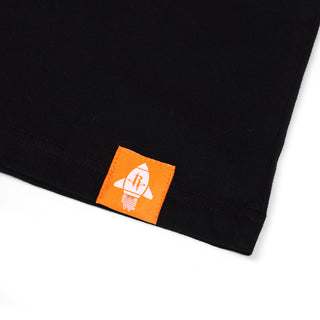 Black fabric with an orange label featuring a white logo on a white background
