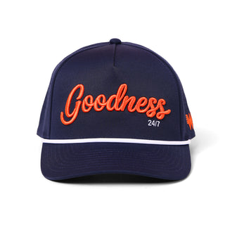 Navy blue cap with orange 'Goodness 24/7' text on a white background